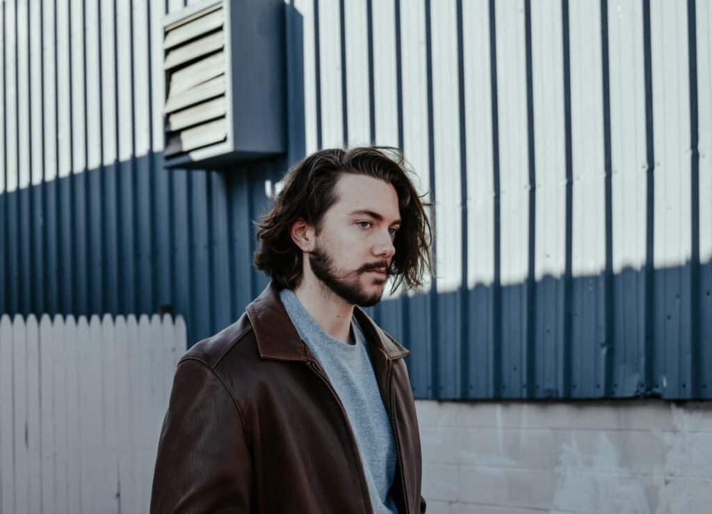 millennial walking and thinking about how to produce a podcast