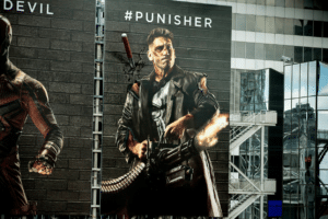 A billboard of Punisher, from Netflix's "Daredevil" to help explain podcast audience engagement tactics.
