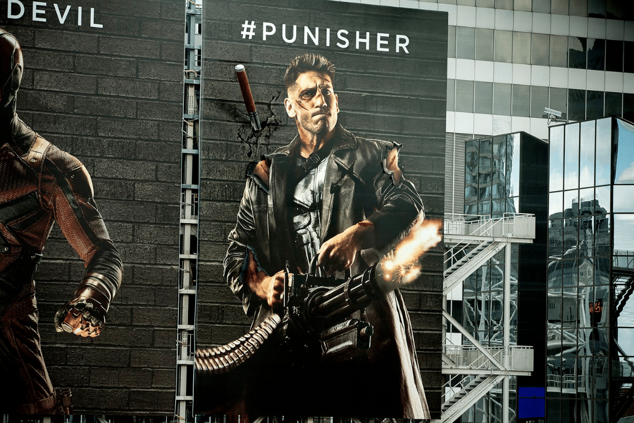 A billboard of Punisher, from Netflix's "Daredevil" to help explain podcast audience engagement tactics.