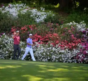 A golfer walking down the fairway at Augusta National, comparing the podcast experience.