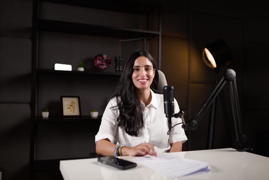 Female podcast host on set